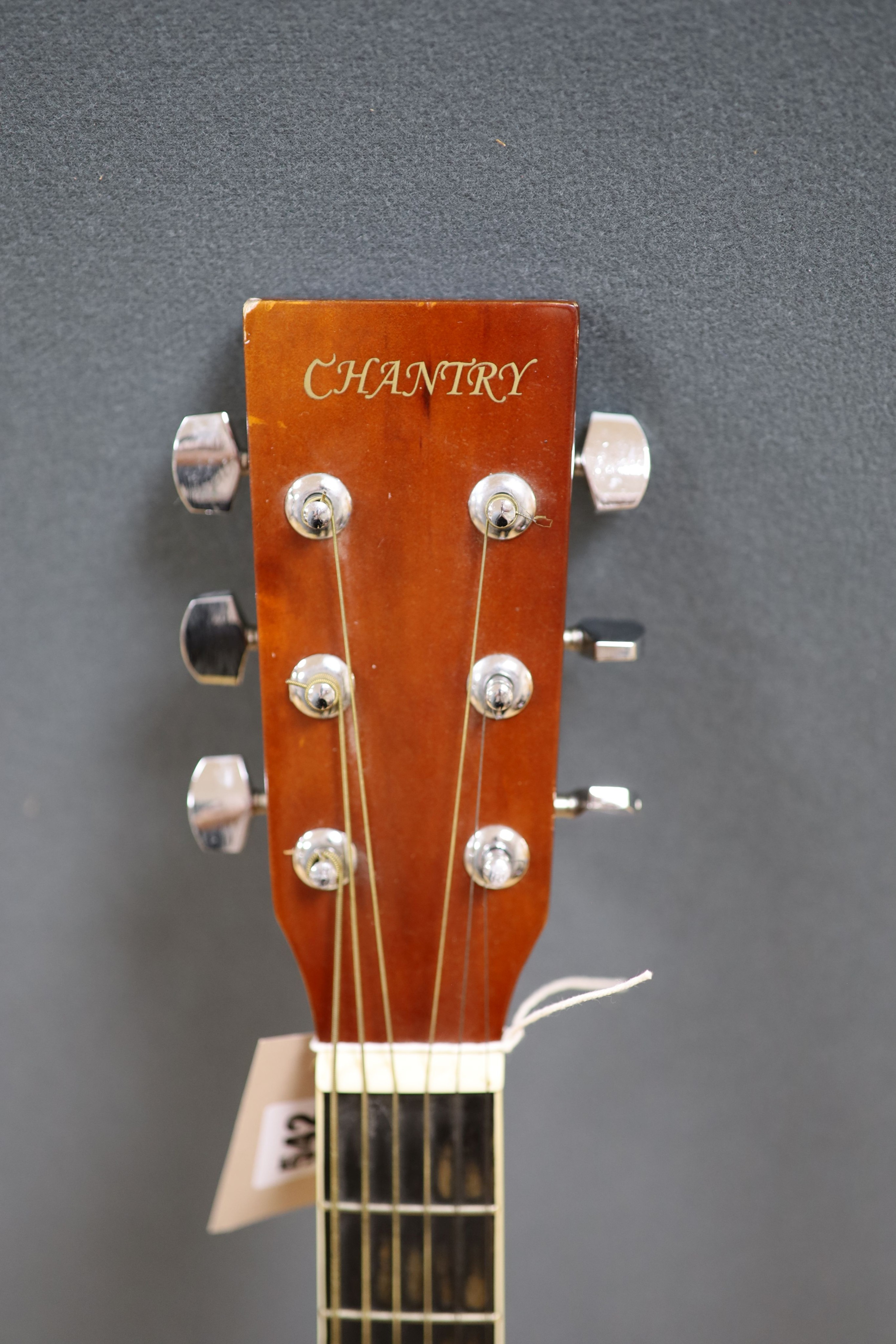 A Chantry Sunburst acoustic guitar